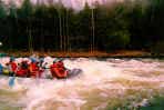 Two people fall out of the raft
