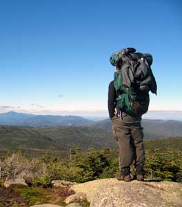 hiker on top of mountain
