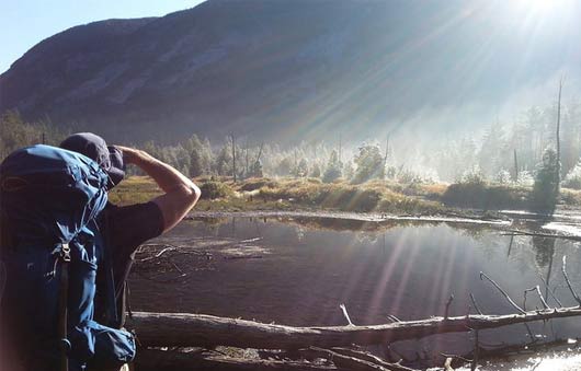 hiker and bright sun