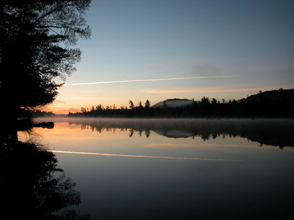 still morning with light fog over water