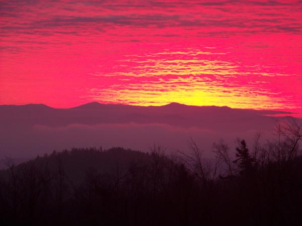 Red sunset over a mountain ridge