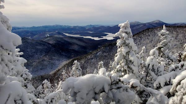 snow covered strees overlooking lake placid