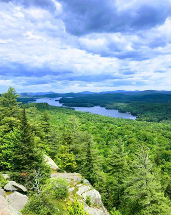 summit overlooking a lake