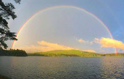 rainbow over a lake
