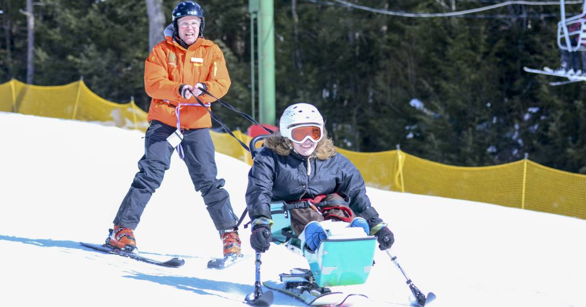 an adaptive skier