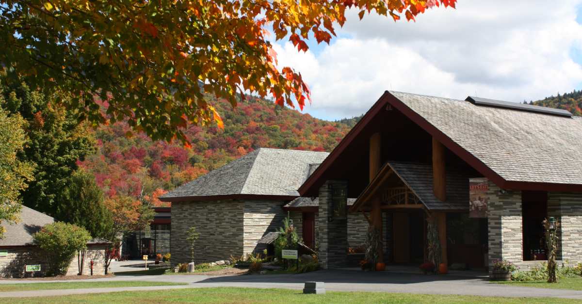 exterior of the adirondack experience museum in the fall