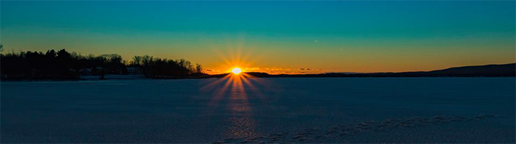 sunset over great sacandaga lake in winter