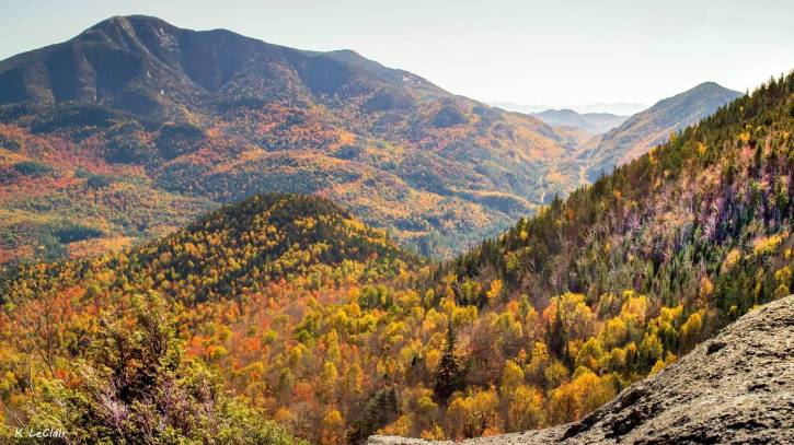 Yellow and red foliage on mountains in the sun