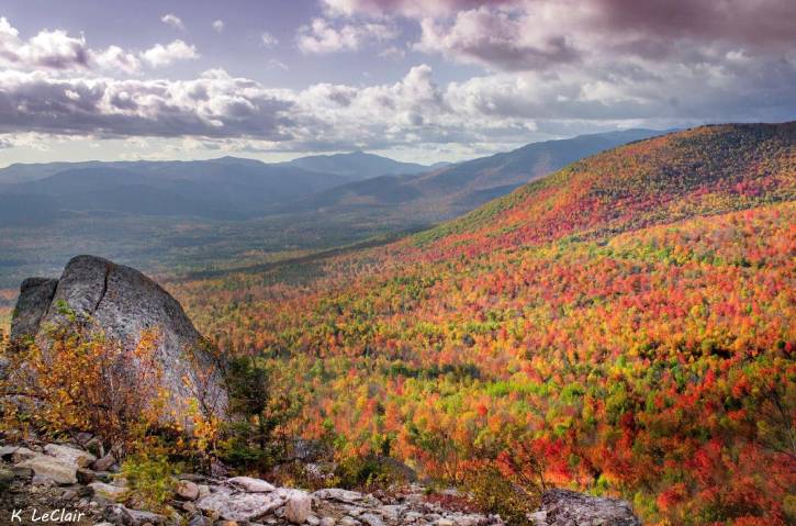 Red and yellow mountains on a cloudy day