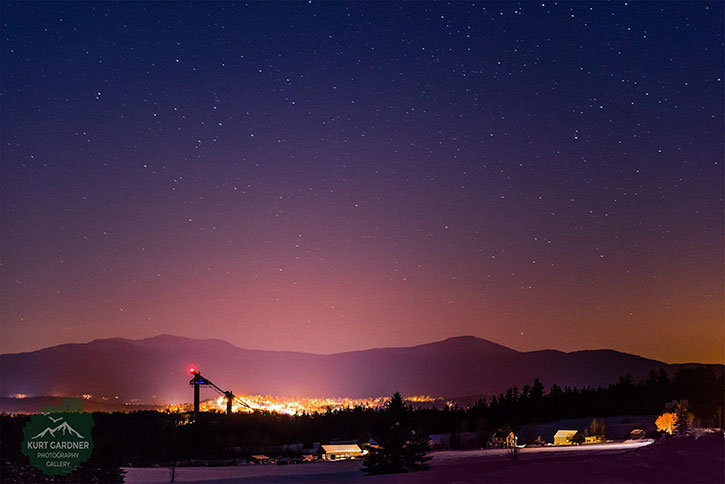 ski jumps outside lake placid under starry sky