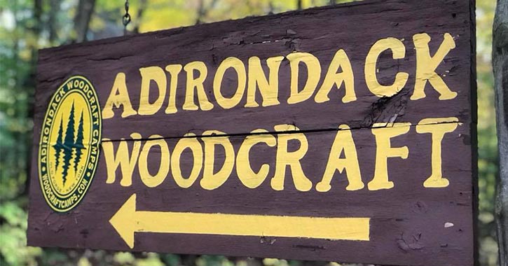 adirondack woodcraft camps sign