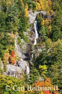 roaring brook falls surrounded by fall foliage