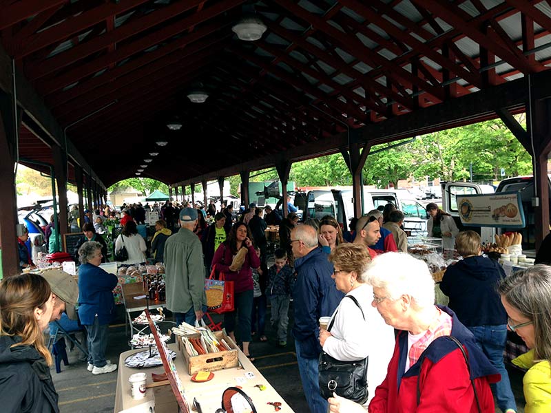 customers strolling a farmers market