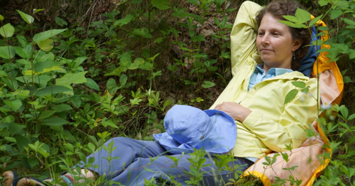 woman relaxing on the ground