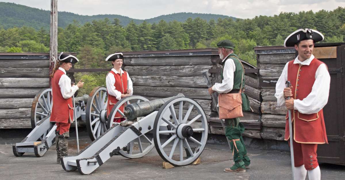 reenactors with a cannon at fort william henry