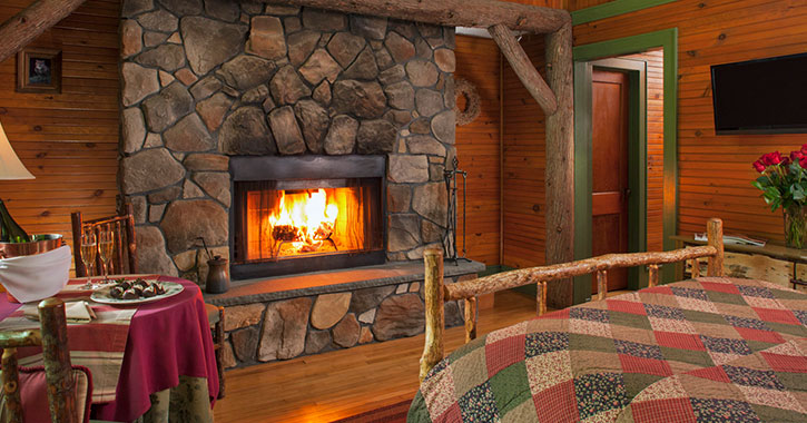 roaring fireplace in a guest room