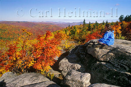 kid on summit in fall