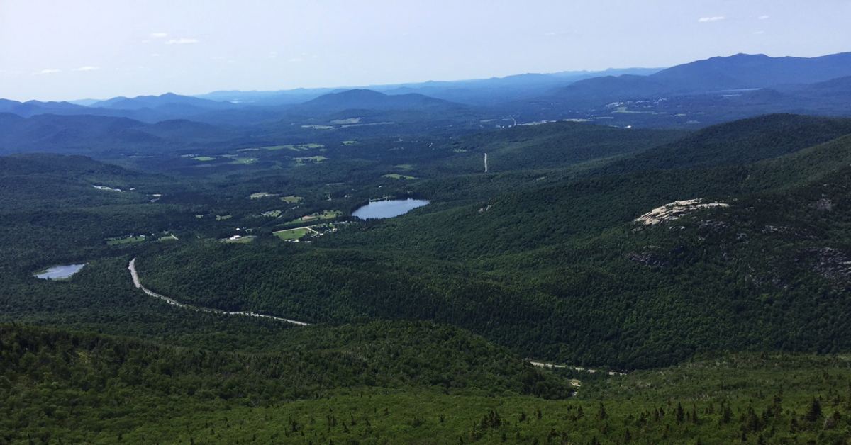 lakes and ponds as seen from the top of a high peak