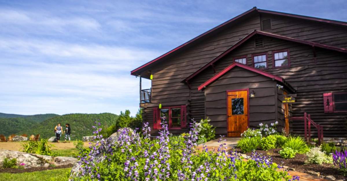 exterior of a wooden lodge in summer