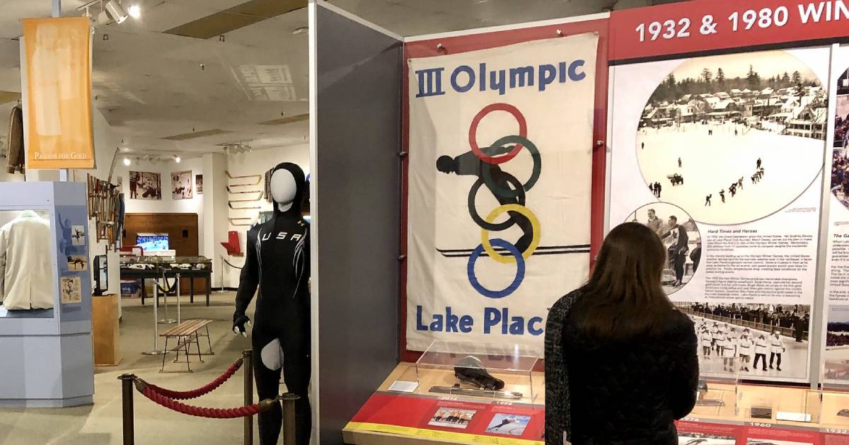 woman looking at display in museum