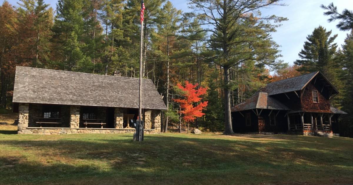 a stone building near a flagpole