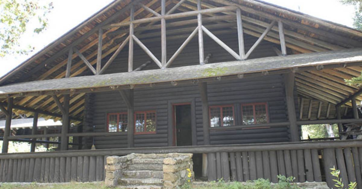 the front of a dark wooden rustic building