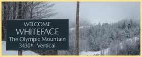 whiteface mountain trail sign in snow