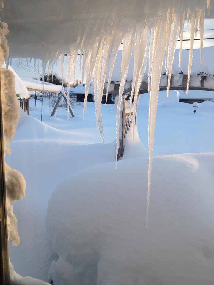 snow and hanging icicles